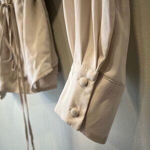 Dynamite tie wrap blouse, size small. Gently worn once, like new condition.